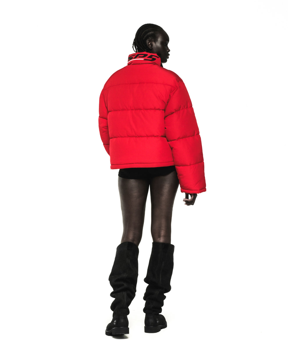 Red TRACKHAWK PUFFER JACKET with reflective text, poly-fill, and side pockets.