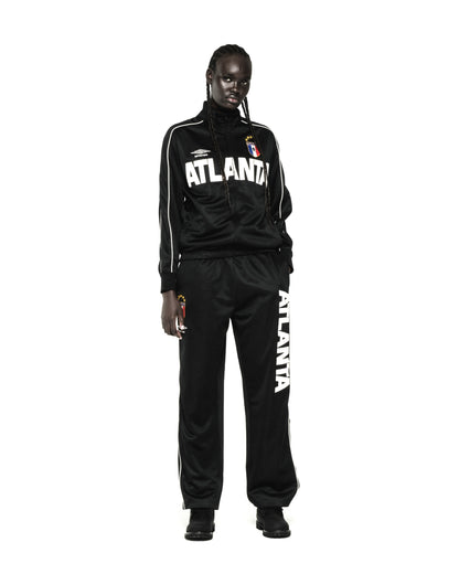 Black polyester Atlanta Track Jacket and pants with white lettering, SP5DER crests, and contrasting piping.