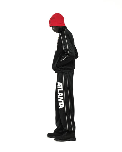 Black ATLANTA TRACK JACKET with white piping, SP5DER crest, and "ATLANTA" on pants.