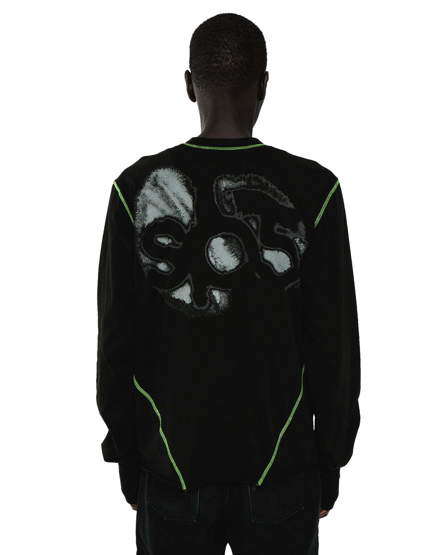 Black cotton long sleeve tee with "SOS" graphic print and neon green contrast stitching.