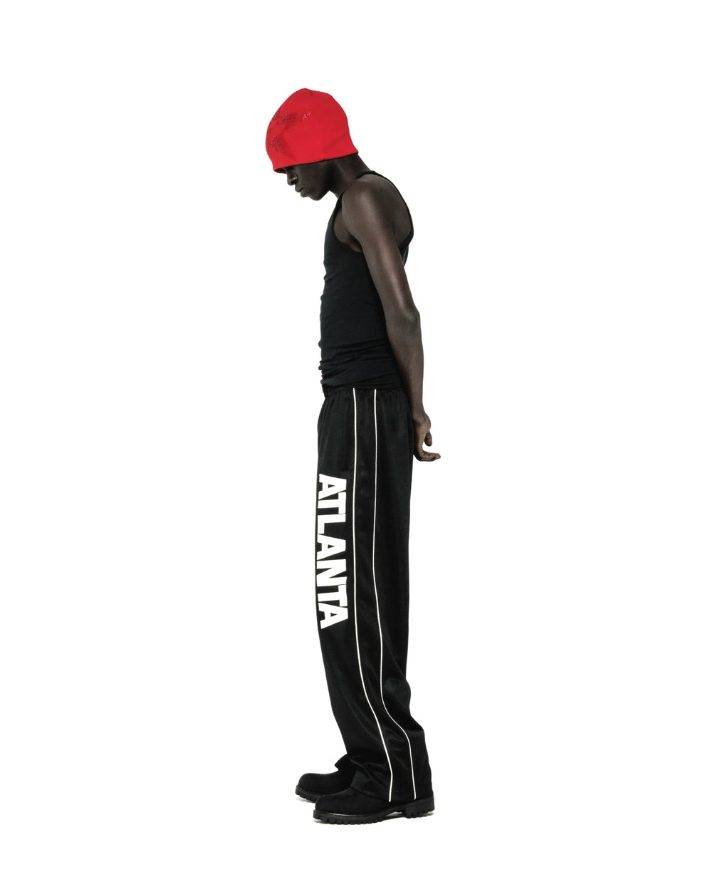 Black ATLANTA TRACK PANT with bold vertical graphic, white contrast piping, and SP5DER crest.