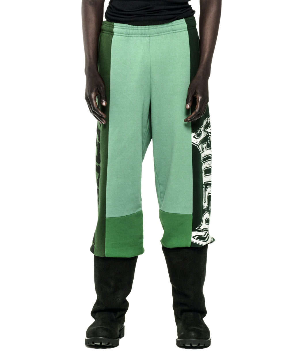 SUPERFIVE SWEATPANT: Green 13oz cotton fleece with contrast panels, graphic print, wide-leg, and raw hem.