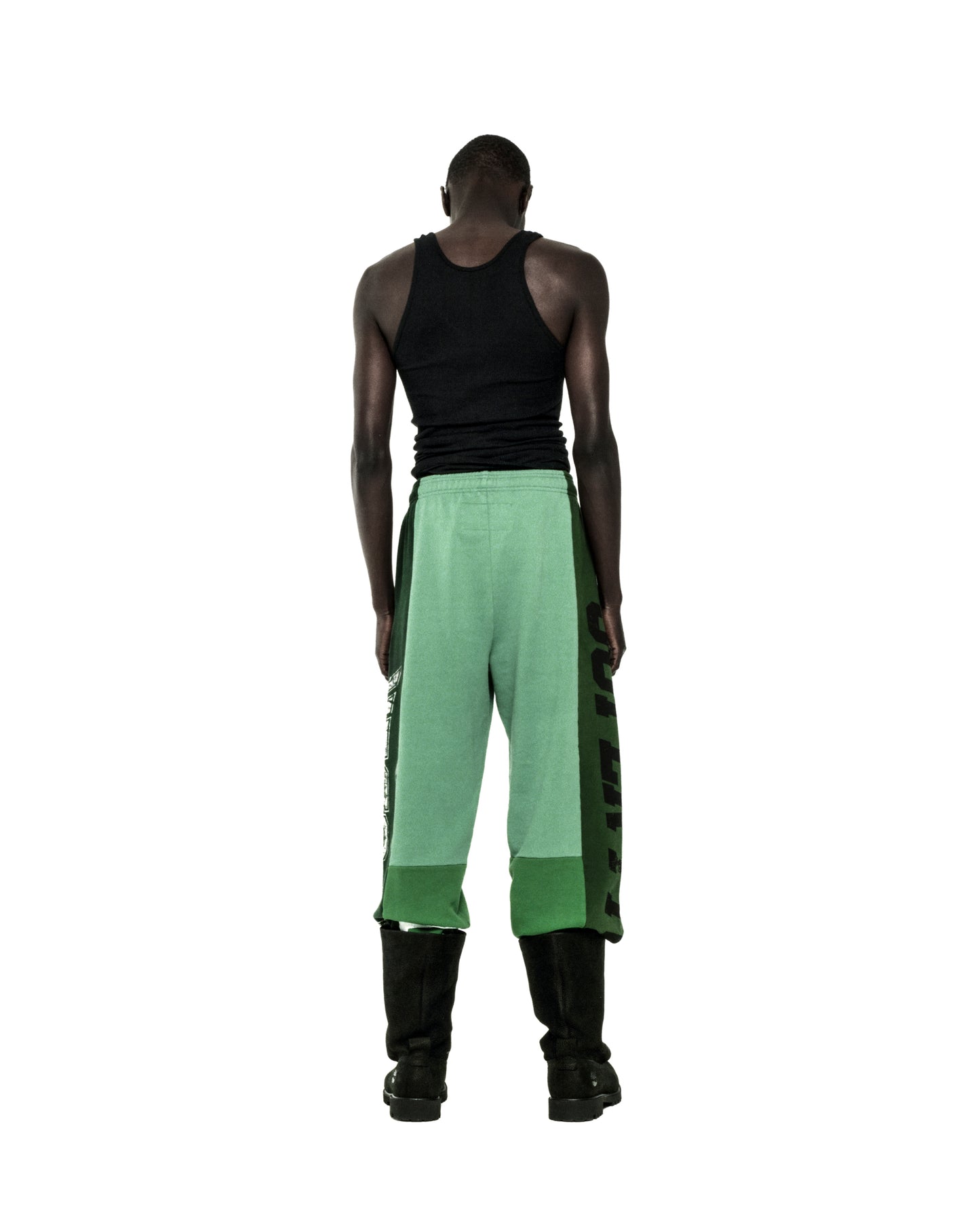 SUPERFIVE SWEATPANT: Green 13oz cotton fleece with contrast panels, graphic print, and wide-leg raw hem.