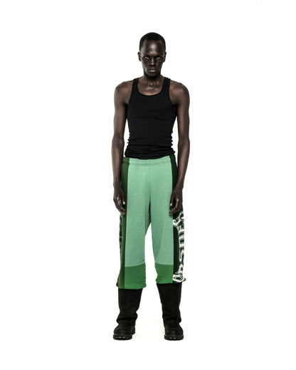 SUPERFIVE SWEATPANT: Green 13oz cotton fleece with contrast panels, custom graphic print, and raw hem.