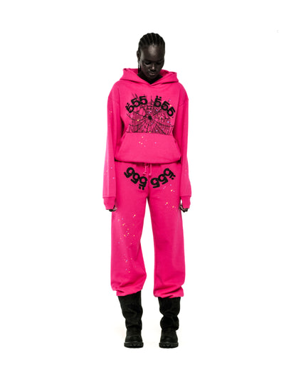 Pink ANGEL NUMBER HOODIE and sweatpants set with '555' web print, scattered stars, and SP5DER logo.