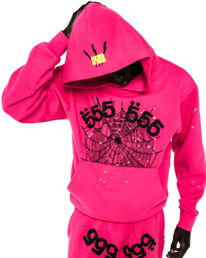 Pink 13oz cotton fleece hoodie with '555' angel numbers, web print, scattered stars, and SP5DER logo.
