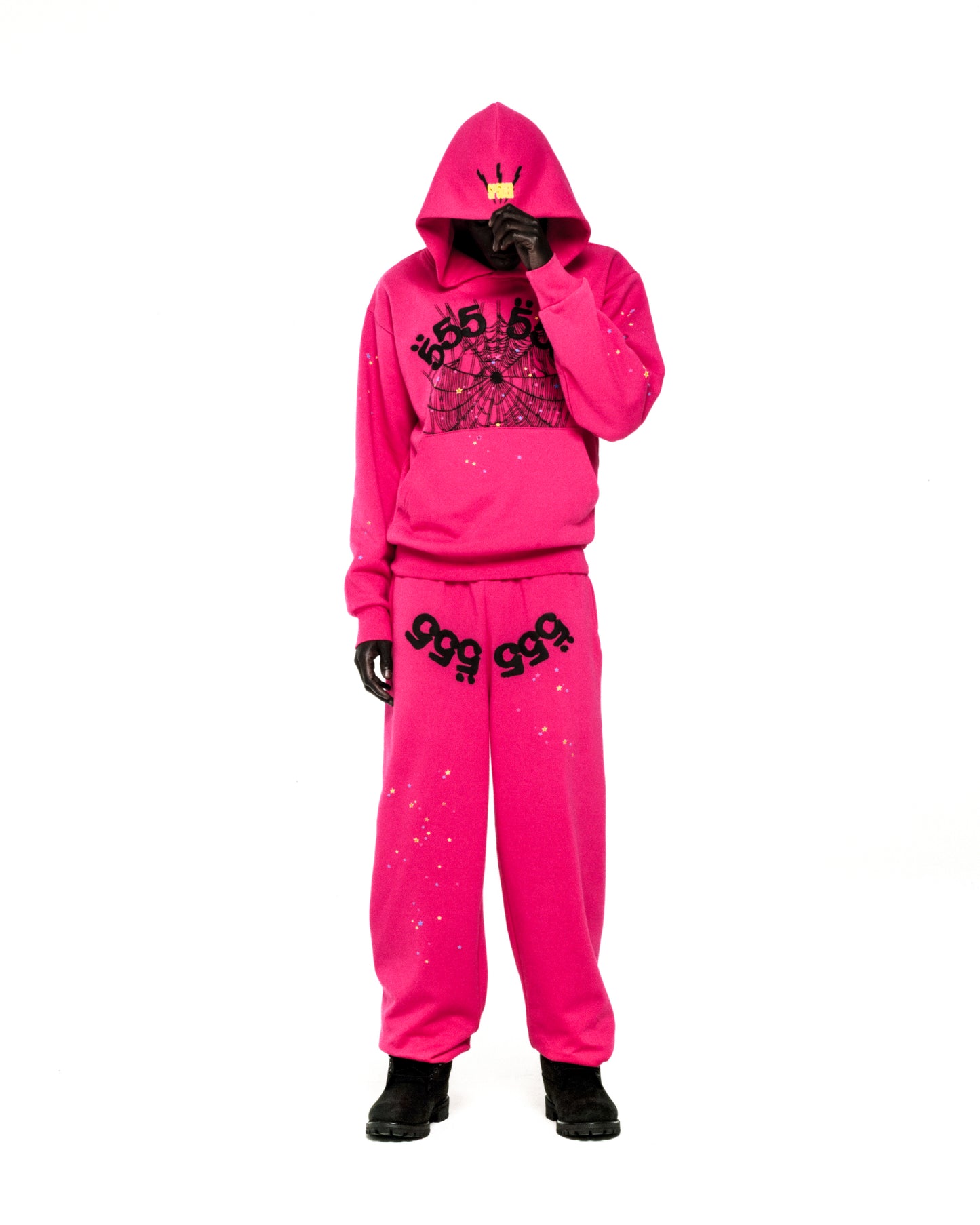 Pink ANGEL NUMBER HOODIE and sweatpants with '555' web print, scattered stars, and SP5DER logo.