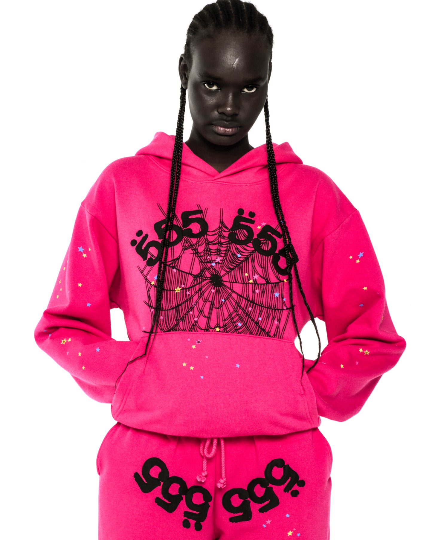 Hot pink 13oz cotton fleece hoodie with black '555' angel numbers, spiderweb, and scattered stars.