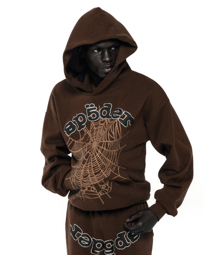 Brown RHINESTONE OG WEB HOODIE with rhinestone spiderweb and text detail, kangaroo pocket.