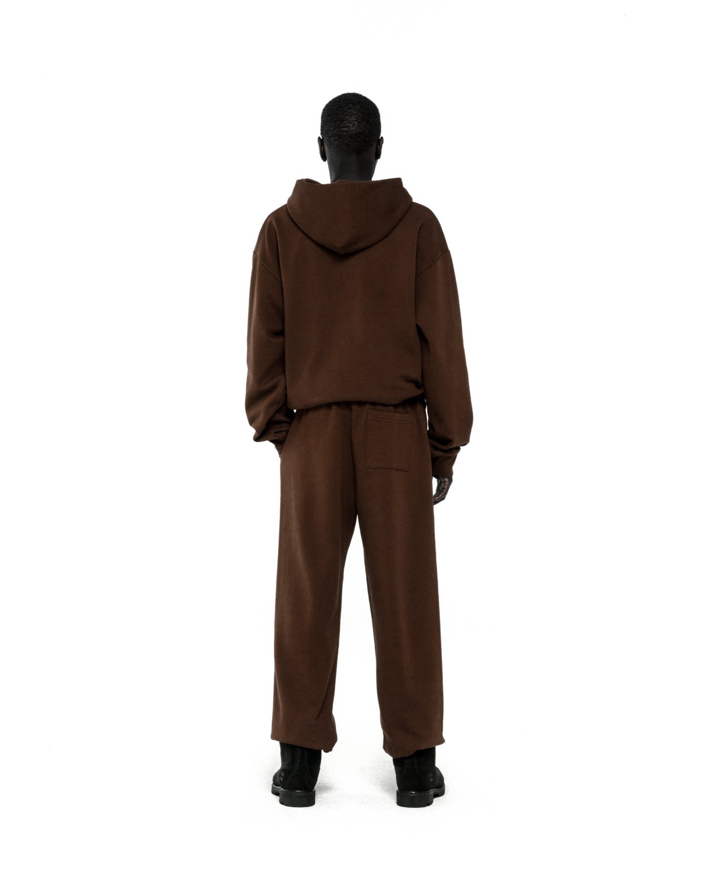 Back view of a dark brown RHINESTONE OG WEB HOODIE and sweatpants set on a mannequin.