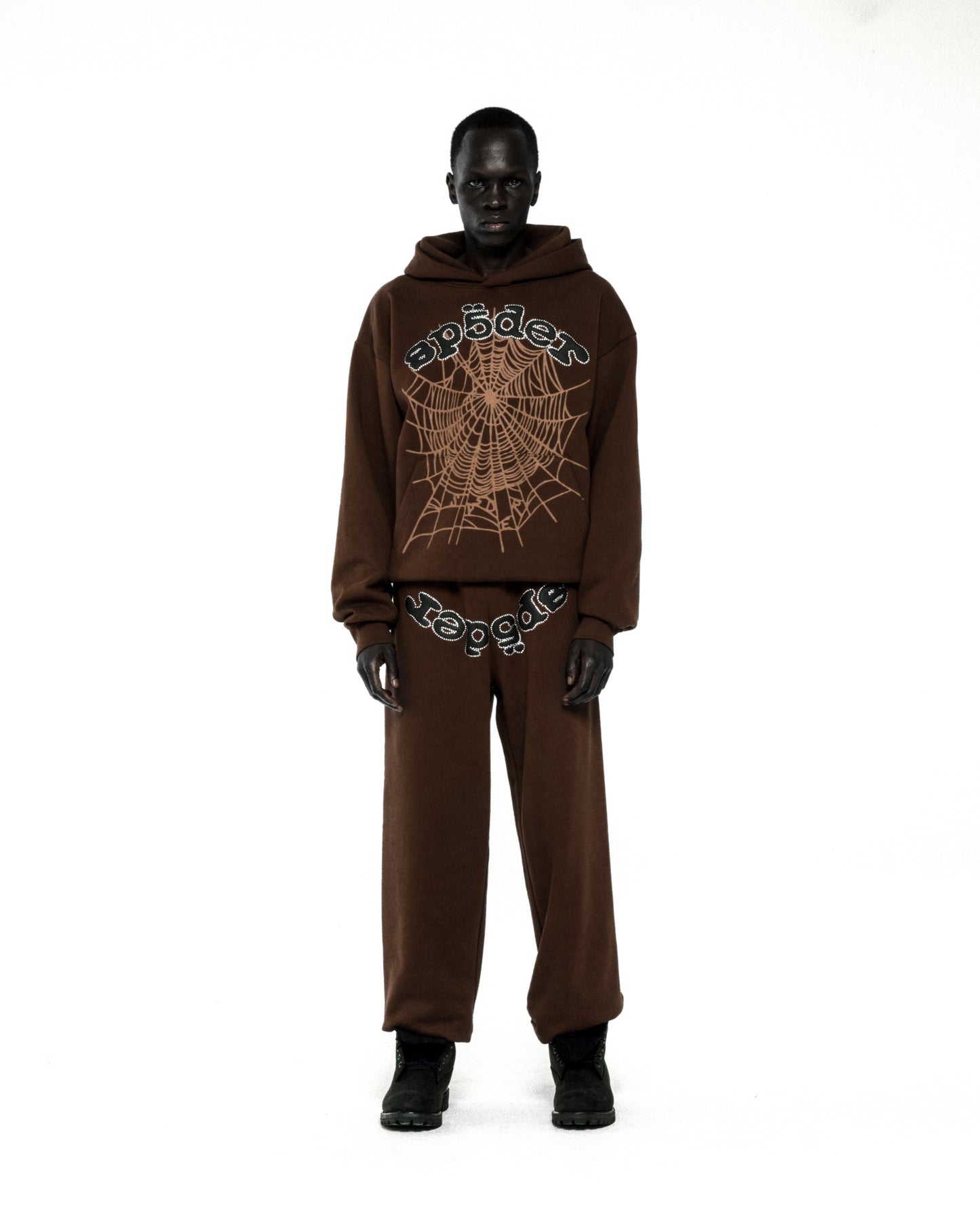 Brown cotton fleece hoodie and sweatpants with rhinestone web and text detail.