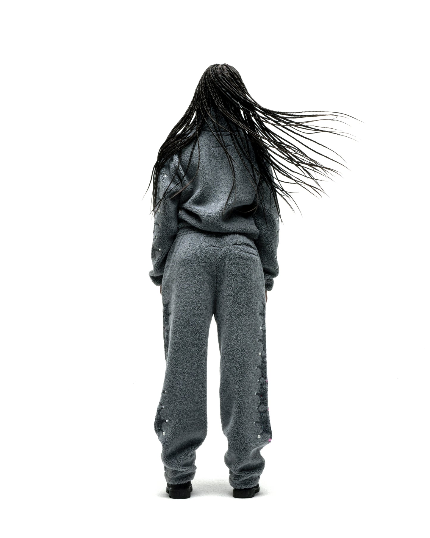 Gray sherpa fleece zip-up jacket and matching pants with web print and rhinestone embellishments.