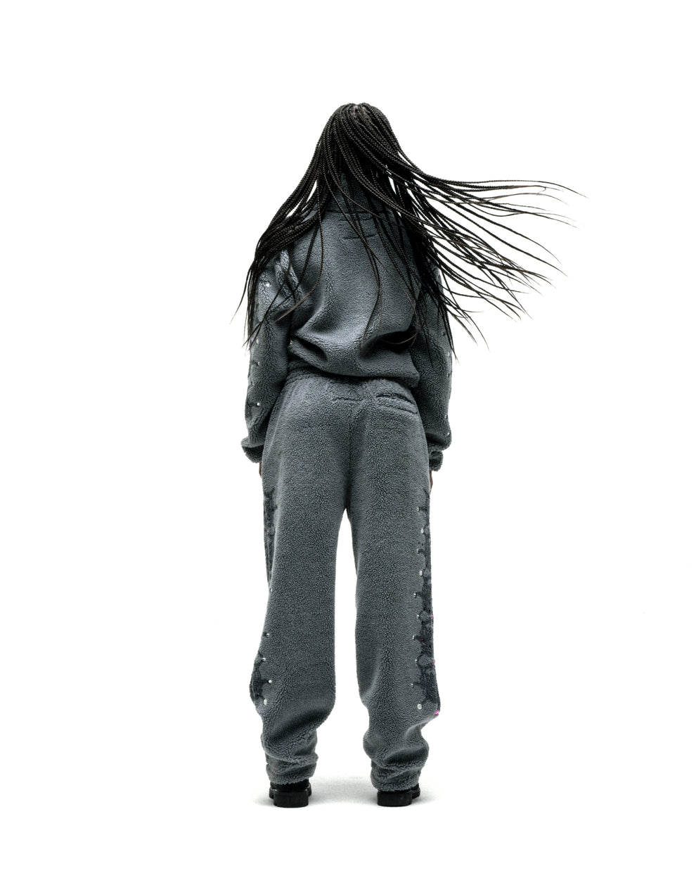 Gray sherpa fleece zip-up jacket and matching pants with web print and rhinestone embellishments.