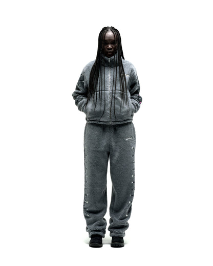 Gray sherpa fleece zip-up jacket and matching pants with rhinestone embellishments.