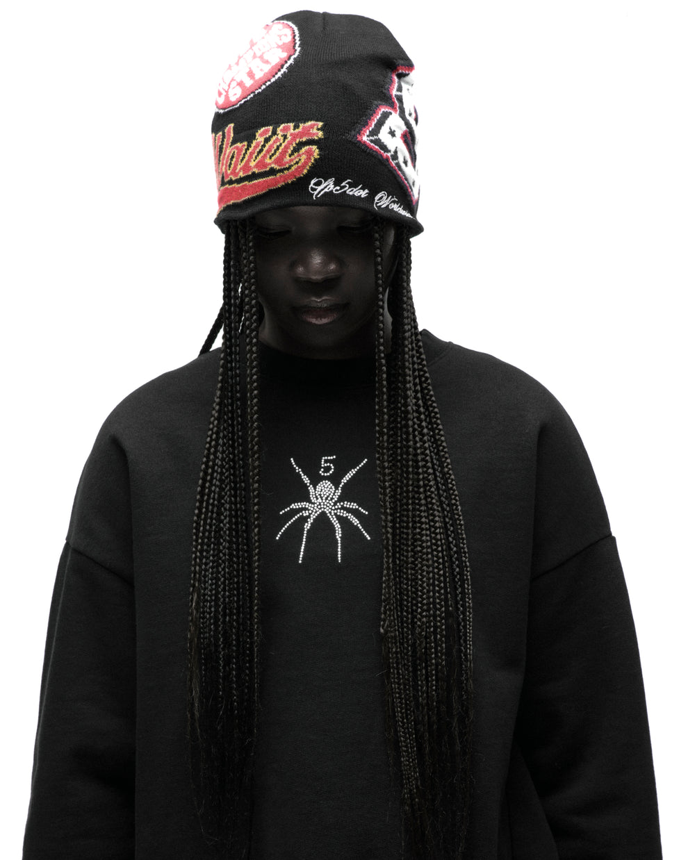 Black cotton crewneck with a rhinestone spider graphic on the front.