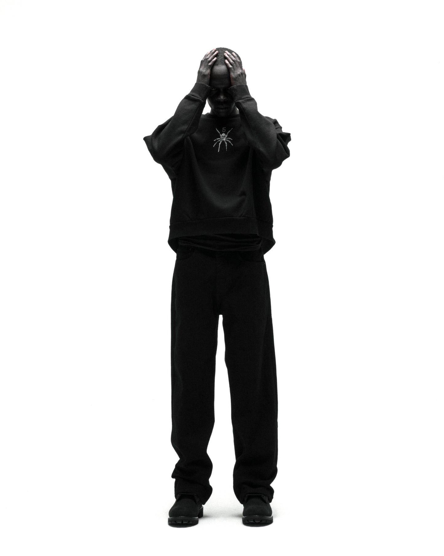 Black RHINESTONE TM CREWNECK with spider graphic, 100% cotton brushed fleece.