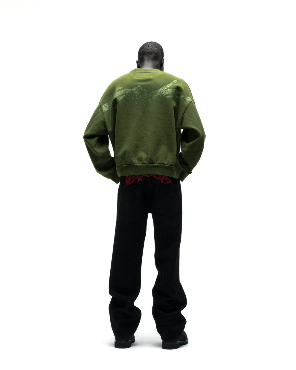 Green RHINESTONE TM CREWNECK, 100% cotton brushed fleece, with rhinestone graphic on back.