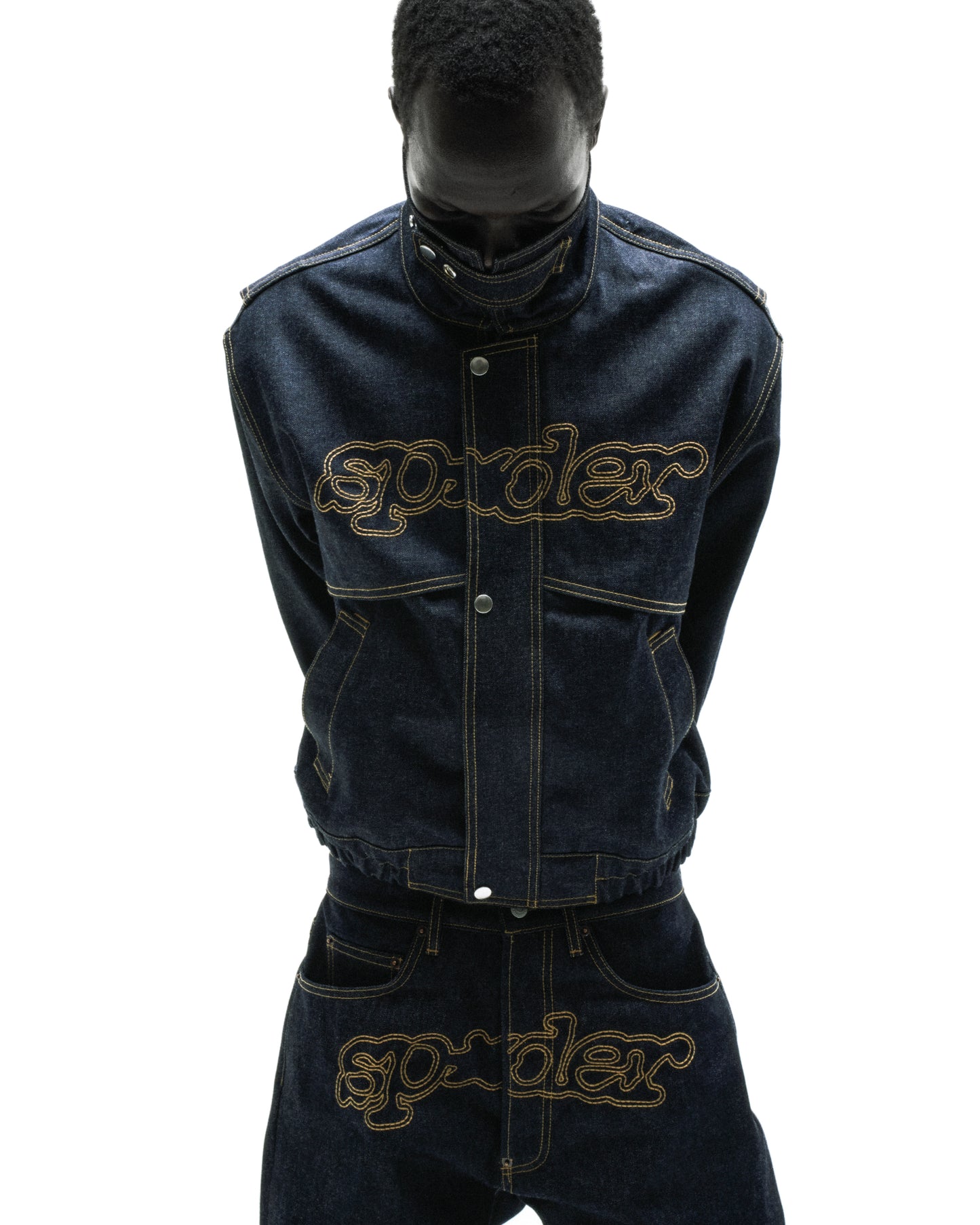 Dark wash PUNK V3 denim jacket with yellow embroidered script logo, stand collar, zipper, and snap placket.