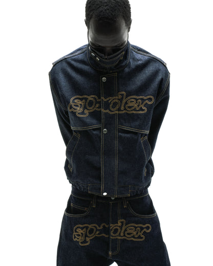 Dark wash denim jacket and jeans with "SP5DER" embroidered in gold across the chest and crotch.