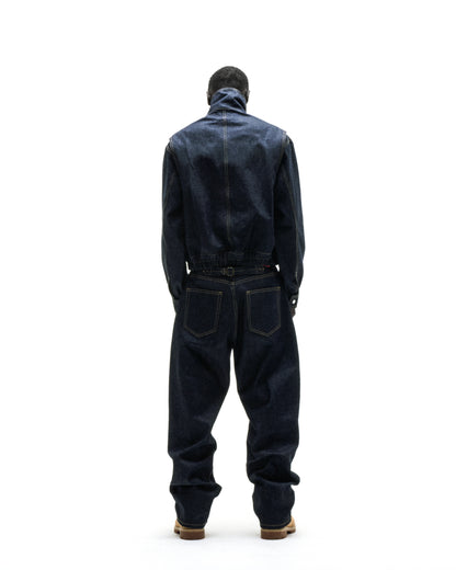 Dark wash denim jacket and pants with yellow stitching, custom script logo, and silver hardware.