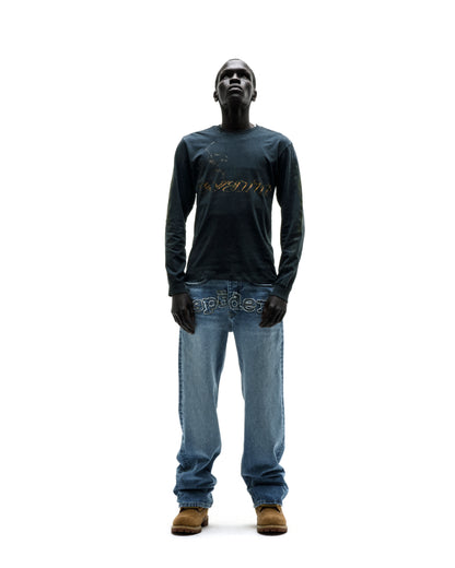 Dark grey 100% cotton long sleeve tee with gold graphic print on sleeves, worn by a model.