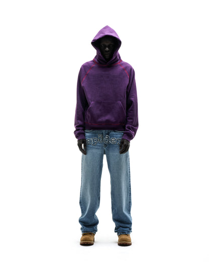 Purple SPLAT COLLISION HOODIE with graphic print, contrast red stitching, kangaroo pocket, and rib knit trims.