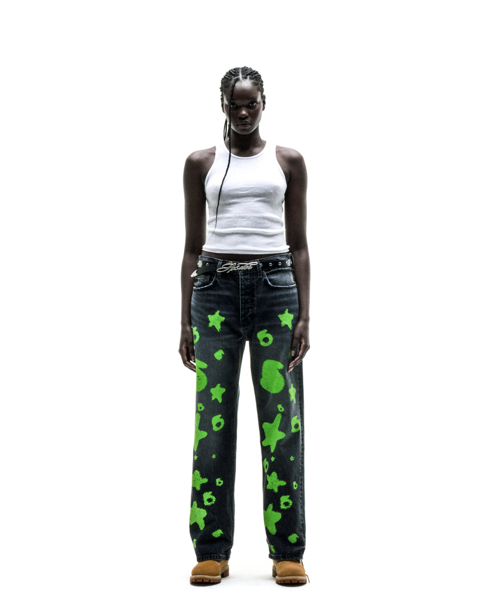 Faded wash BELUGA STAMP DENIM jeans with green star and number design, custom hardware, and straight leg fit.