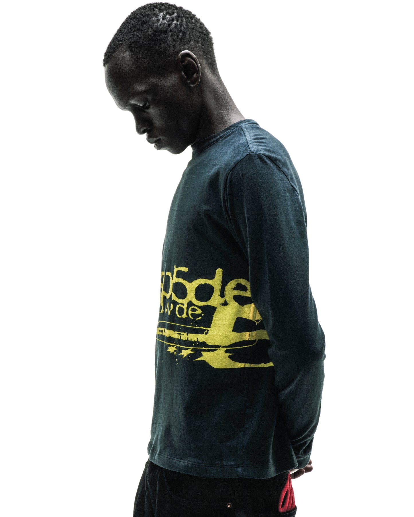 Dark blue 100% cotton long sleeve tee with a distressed yellow graphic print on the front.