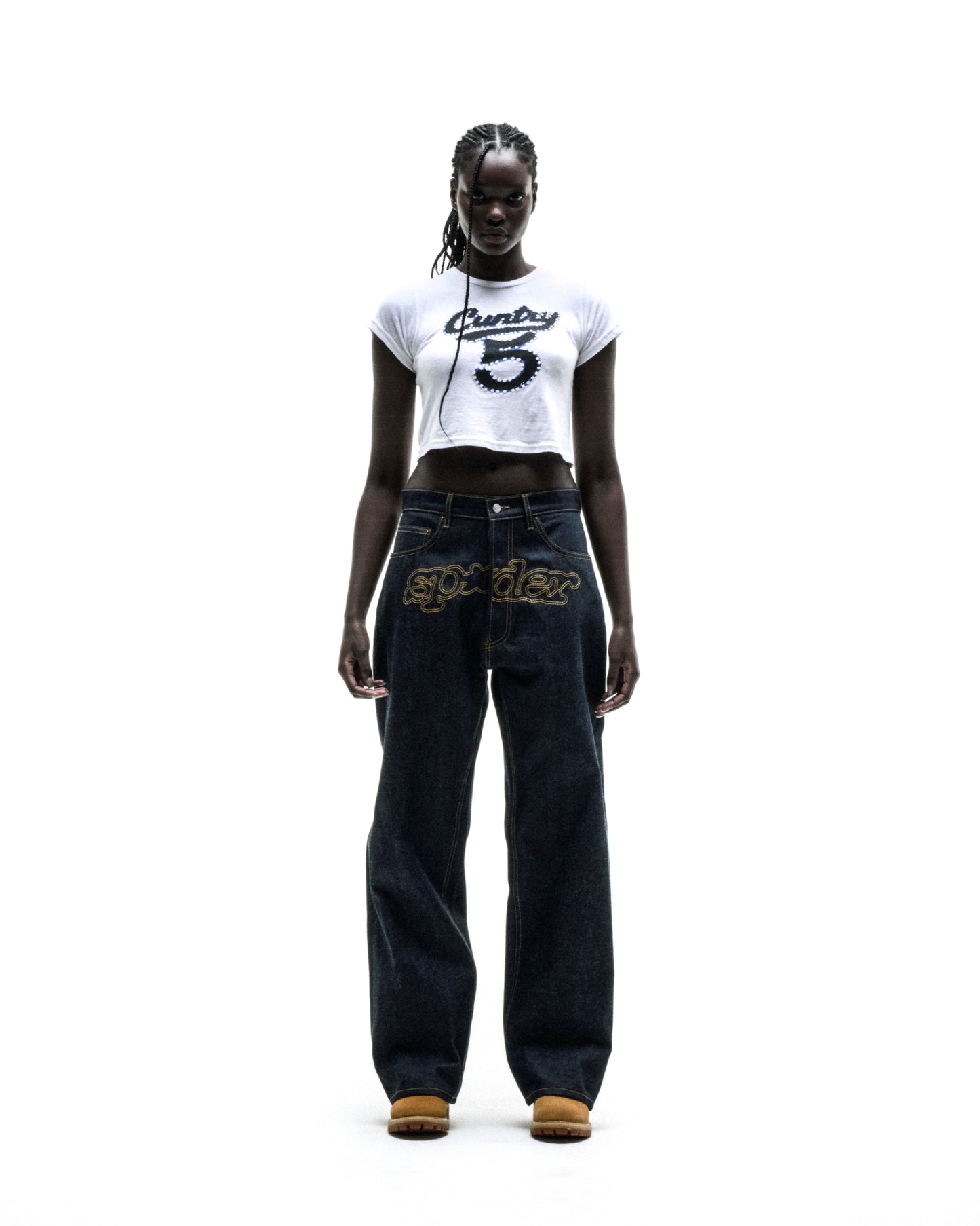 White cotton/spandex cropped tee with "CUNTRY 5" graphic print worn by a model.