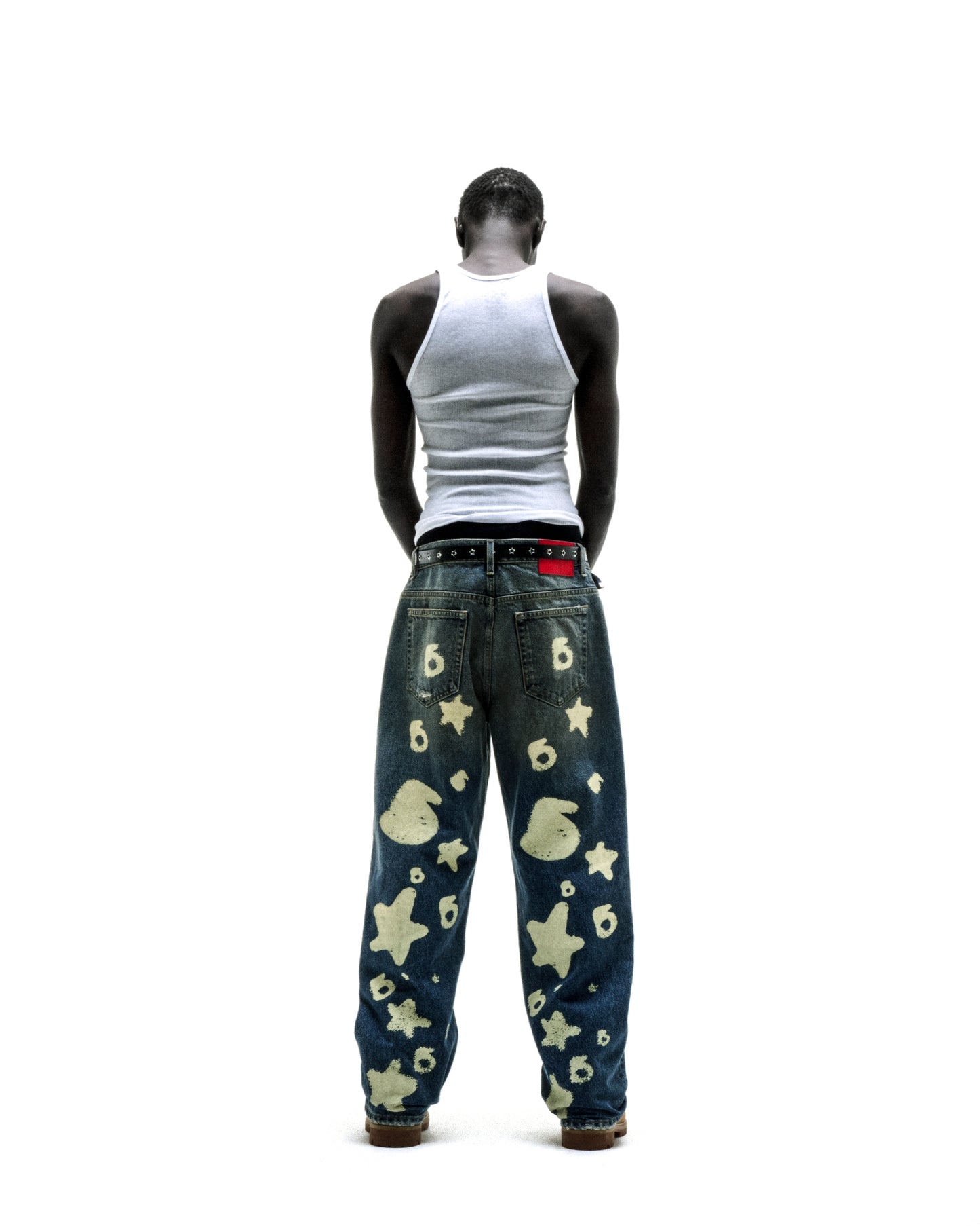 BELUGA STAMP DENIM jeans with unique white star and "6" designs, custom hardware, and a classic straight leg fit.