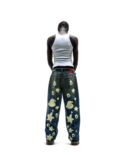 BELUGA STAMP DENIM jeans with unique white star and "6" designs, custom hardware, and a classic straight leg fit.