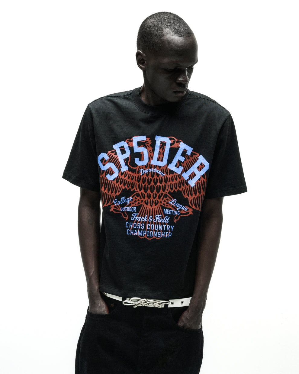 Black cotton tee with "SPSDER" in blue and red eagle graphic.