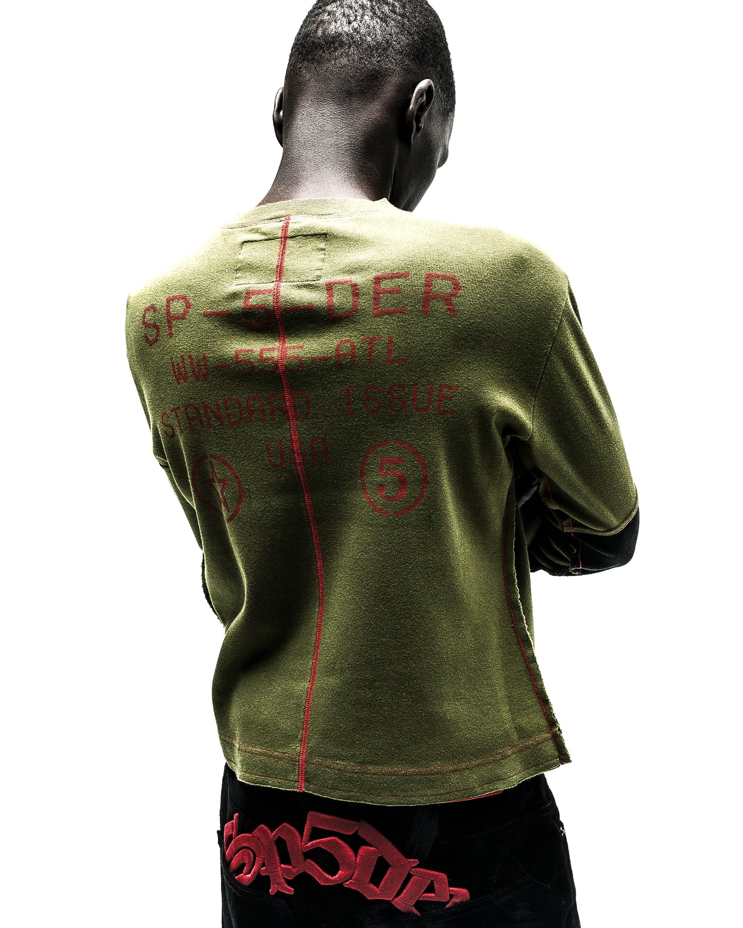 Olive green knit longsleeve with red "SPIDER" text and graphic details on the back.